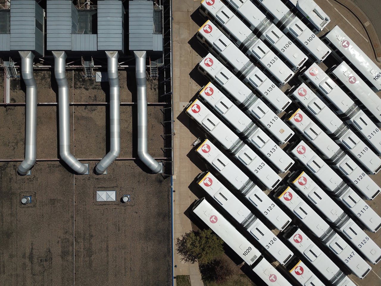 portfolio-03 High-angle shot capturing buses and industrial HVAC systems on a rooftop in Minneapolis.